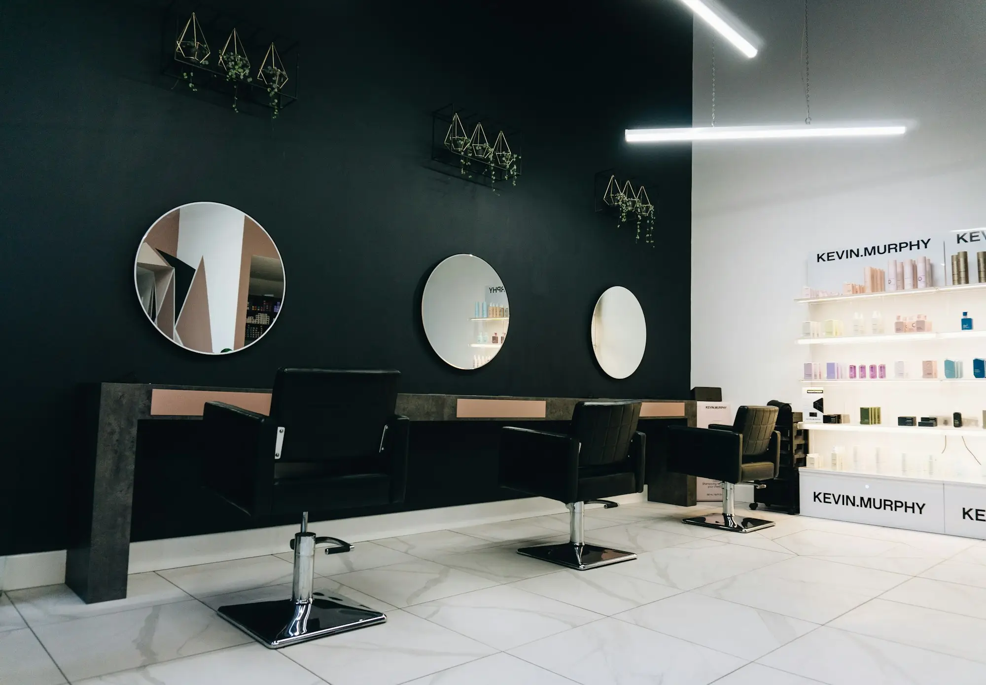Refurbished hair salon with new chairs, mirrors and lighting